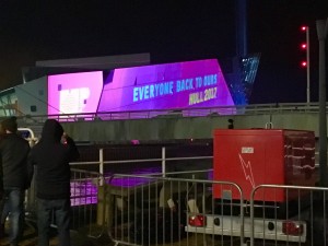 The Deep at night projecting one of the Hull 2017 City of Culture slogans, 'Everyone back to Ours'