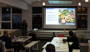 Meg giving a talk on food
