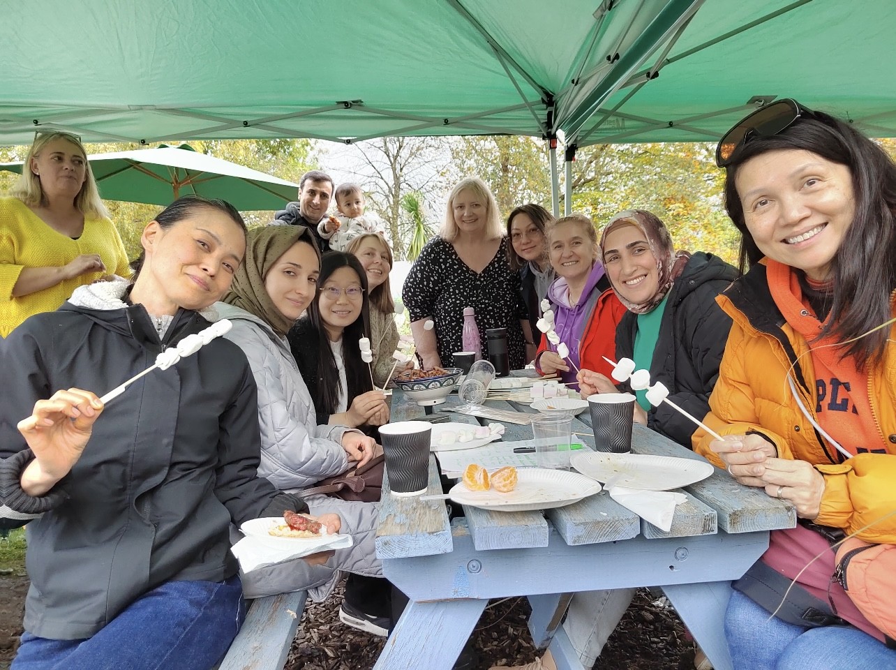 Summer BBQ event including sanctuary seekers, other members of the Haxby Road allotment, students, and staff from Refugee Action York. 