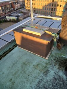 Peregrine falcon bird box at top of Central Accommodation