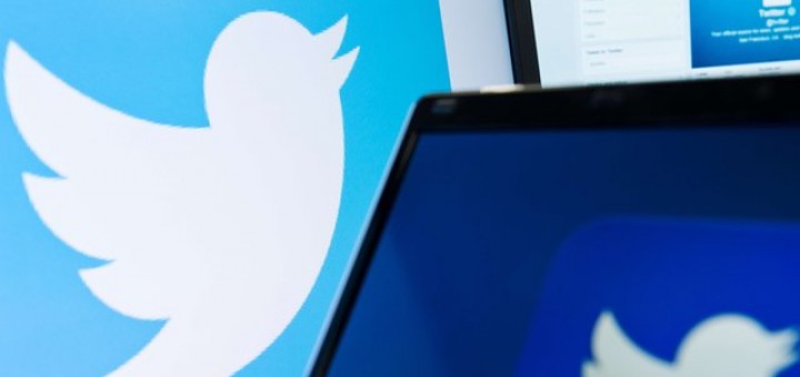 Image of the Twitter logo on the left and a tablet screen on the right also displaying the Twitter logo.