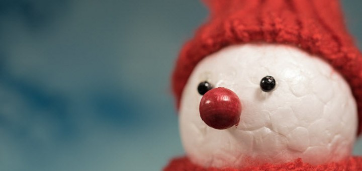 Photograph of polystyrene snowman with red scarf and hat