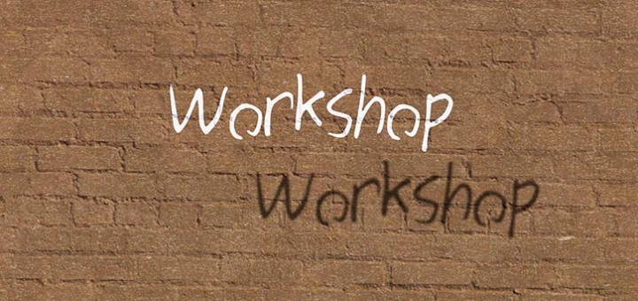 Image of a wall with the word 'Workshop' painted on it.